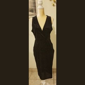 Low v-neck cut black with color dots dress